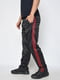Спортивные штаны черного цвета с контрастными полосками | 6686802 | фото 2
