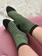 Шкарпетки махрові чорного кольору із зеленою смужкою | 6687530