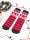 Дитячі махрові новорічні шкарпетки червоного кольору з принтом “Санта та Ялинки” | 6698239