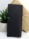 Кожаный вертикальный кошелек в черном цвете | 6084802 | фото 3