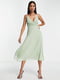 Светло-зеленое платье со шнуровкой на спинке и лифом "на запах" | 6507260
