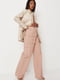 Пудрово-рожеві штани прямого вільного крою на резинці з накладними кишенями | 6699322 | фото 3