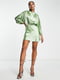 Яскрава зелена міні-сукня з відкритою спиною та вільними рукавами
 | 6699391 | фото 3