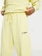 Жовті спортивні штани з написом | 6699577 | фото 4