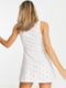 Біла міні-сукня з вишивкою та оригінальним ліфом | 6699652 | фото 4