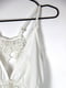 Сукня А-силуету біла з мереживними вставками та широкою оборкою по поділу | 6699741 | фото 2