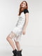 Сукня біла на вузьких бретелях, прикрашена вишивкою та бахромою | 6699810 | фото 2