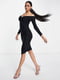 Чорна облягаюча сукня з ефектними плечима | 6700150