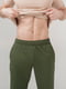Трикотажні зелені штани з резинкою | 6704919 | фото 3