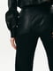 Чорні комбіновані штани розкльошені | 6706683 | фото 8