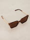 Сонцезахисні окуляри коричневого кольору в анімалістичній оправі | 6707386 | фото 2