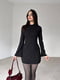Чорна міні-сукня А-силуету з кишенями-обманками | 6710489 | фото 2