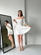 Міні-сукня А-силуету молочного кольору з рукавами-ліхтариками і відкритим декольте | 6710514 | фото 3