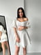 Міні-сукня А-силуету молочного кольору з рукавами-ліхтариками і відкритим декольте | 6710514 | фото 5