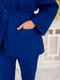 Синій костюм: вільний жакет з поясом та завужені штани | 6712250 | фото 3