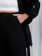 Чорний монохромний костюм: блуза-жакет на зав’язках та штани | 6712265 | фото 3