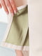 Расклешенные брюки из экокожи с разрезами внизу молочного цвета | 6713372 | фото 6