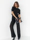 Черный костюм с ажурной вязки: топ и расклешенные брюки | 6721624 | фото 3