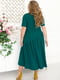Елегантна зелена сукня А-силуету з асиметрично підшитим подолом | 6721797 | фото 4
