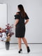 Сукня чорна з вирізом  V-форми декорованим воланом із однієї сторони | 6722133 | фото 5