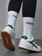 Кросівки білі на шнурівці з різнокольоровими смужками | 6725740 | фото 3