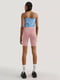 Шорты-леггинсы розового цвета с логотипомTommy Jeans сбоку | 6729714 | фото 4