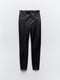 Эластичные облегающие брюки из экокожи черного цвета | 6729803 | фото 7