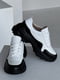 Шкіряні білі кросівки з чорними вставками на масивній підошві | 6730509 | фото 2