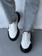 Шкіряні білі кросівки з чорними вставками на масивній підошві | 6730509 | фото 8