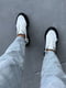 Шкіряні білі кросівки з чорними вставками на масивній підошві | 6730509 | фото 9