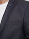 Класичний піджак синього кольору з клапанами на кишенях | 6727494 | фото 4