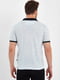 Біла футболка-поло в принт з контрастним коміром та логотипом бренду | 6728931 | фото 5