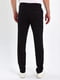 Прямые черные брюки с карманами | 6729197 | фото 4