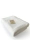 Махровий рушник бежевого кольору в подарунковому пакеті (70 на 140 см)  | 6730835