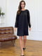 Чорна А-силуетна сукня з мереживним оздобленням та прозорими вставками на рукавах | 6735917 | фото 2