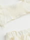 Сукня молочного кольору, що складається з короткого топу та спідниці | 6684782 | фото 3