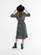 Чорна сукня А-силуету з розкольошеною спідницею | 6737827 | фото 4