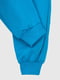 Штани спортивні блакитні з принтом | 6742216 | фото 3