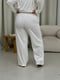 Білі розкльошені штани в рубчик | 6737724 | фото 7