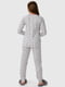 Піжама біла в принт: лонгслів та штани | 6744329 | фото 2