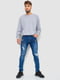 Синие джинсы с потертостями | 6759266 | фото 2