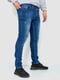 Вузькі сині джинси з потертостями | 6759287 | фото 3