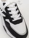 Бело-черные кроссовки на белой подошве | 6759366 | фото 2