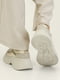 Бежевые кожаные кроссовки с текстильной вставкой | 6759712 | фото 5