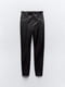 Эластичные облегающие брюки из экокожи черного цвета | 6729803 | фото 16