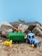 Різнокольорова іграшка “Трактор з причепом та твариною”  | 6748720