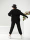 Чорний трикотажний костюм: толстовка та джогери | 6764004 | фото 2