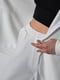 Білий костюм на флісі: подовжена толстовка і штани-палаццо | 6768899 | фото 4