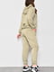 Трикотажний костюм оливкового кольору: худі і джогери | 6768917 | фото 3