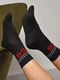 Шкарпетки спортивні чорного кольору з принтом | 6769225 | фото 2